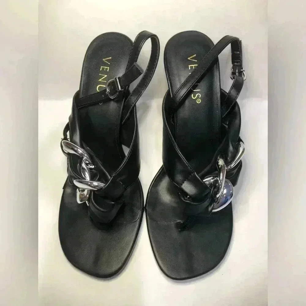 Black and silver heels size 7.5